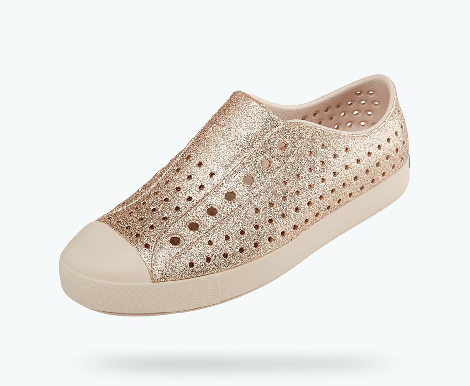 Angled view of a Native Shoes Jefferson Bling | Rock Salt Bling/ Rock Salt Pink Footwear