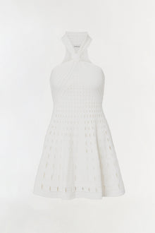 White sleeveless knit mini dress with eyelet cutout details throughout and a fitted bodice.