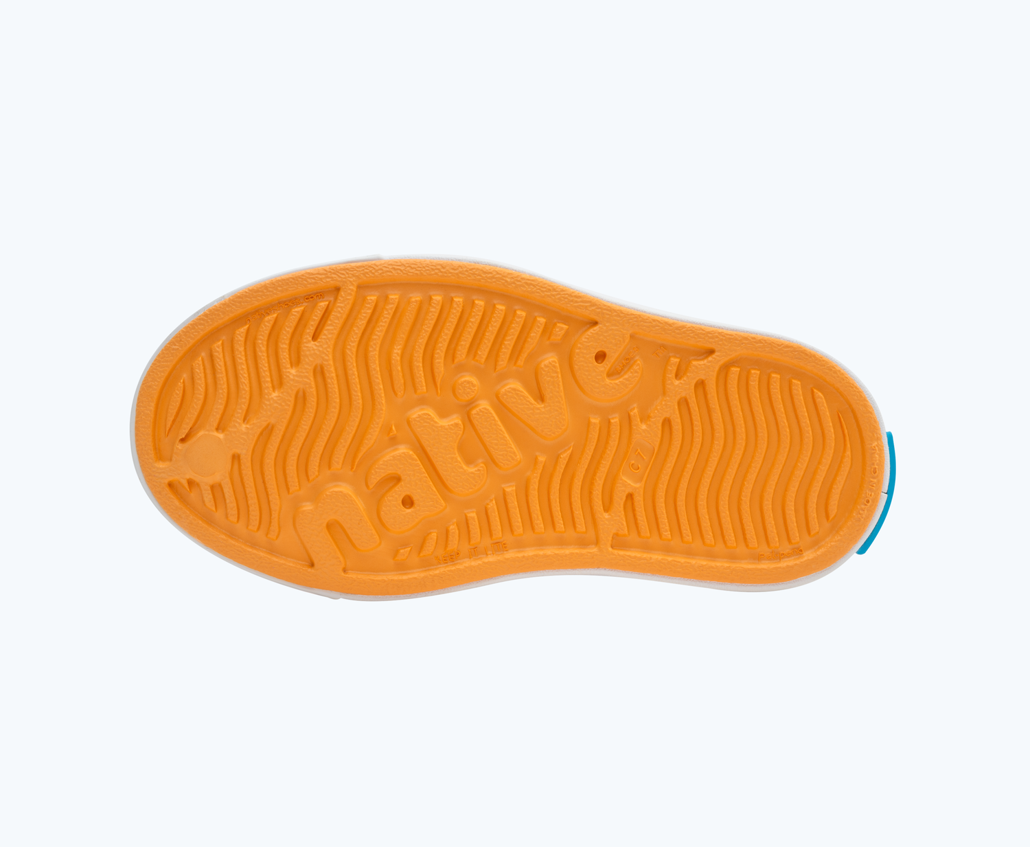 Bottom view of a Native Shoes Kids Jefferson Kids | Papaya Orange/ Shell White Footwear
