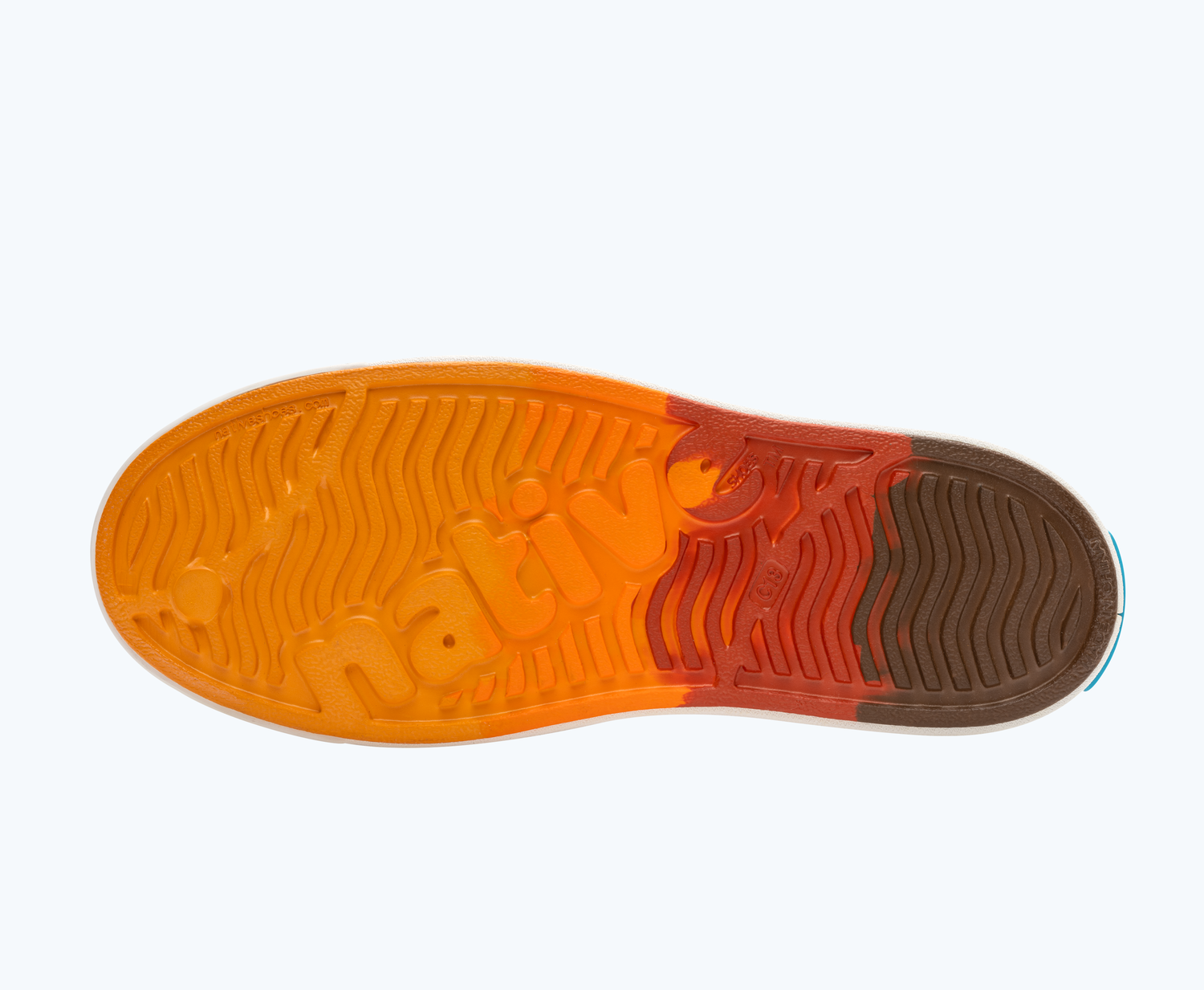Bottom view of a Native Shoes Kids Jefferson Clog Marble Kids | Sunset Roasted Marble/ Shell White Footwear