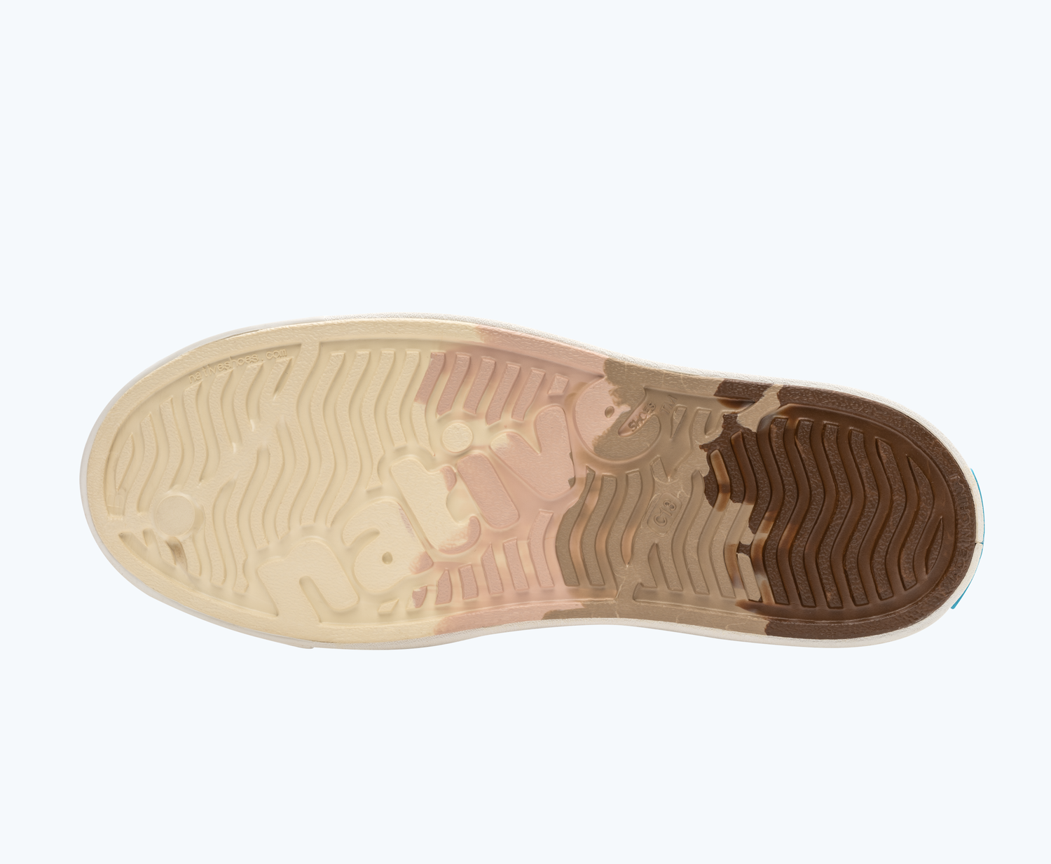 Bottom view of a Native Shoes Kids Jefferson Clog Marble Kids | Chameleon Flax Marble/ Shell White Footwear