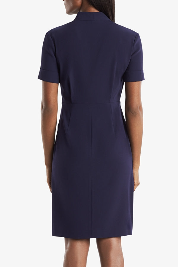 Back image of a woman standing wearing theTory Dress in dark iris | Grid Hover | Exclude