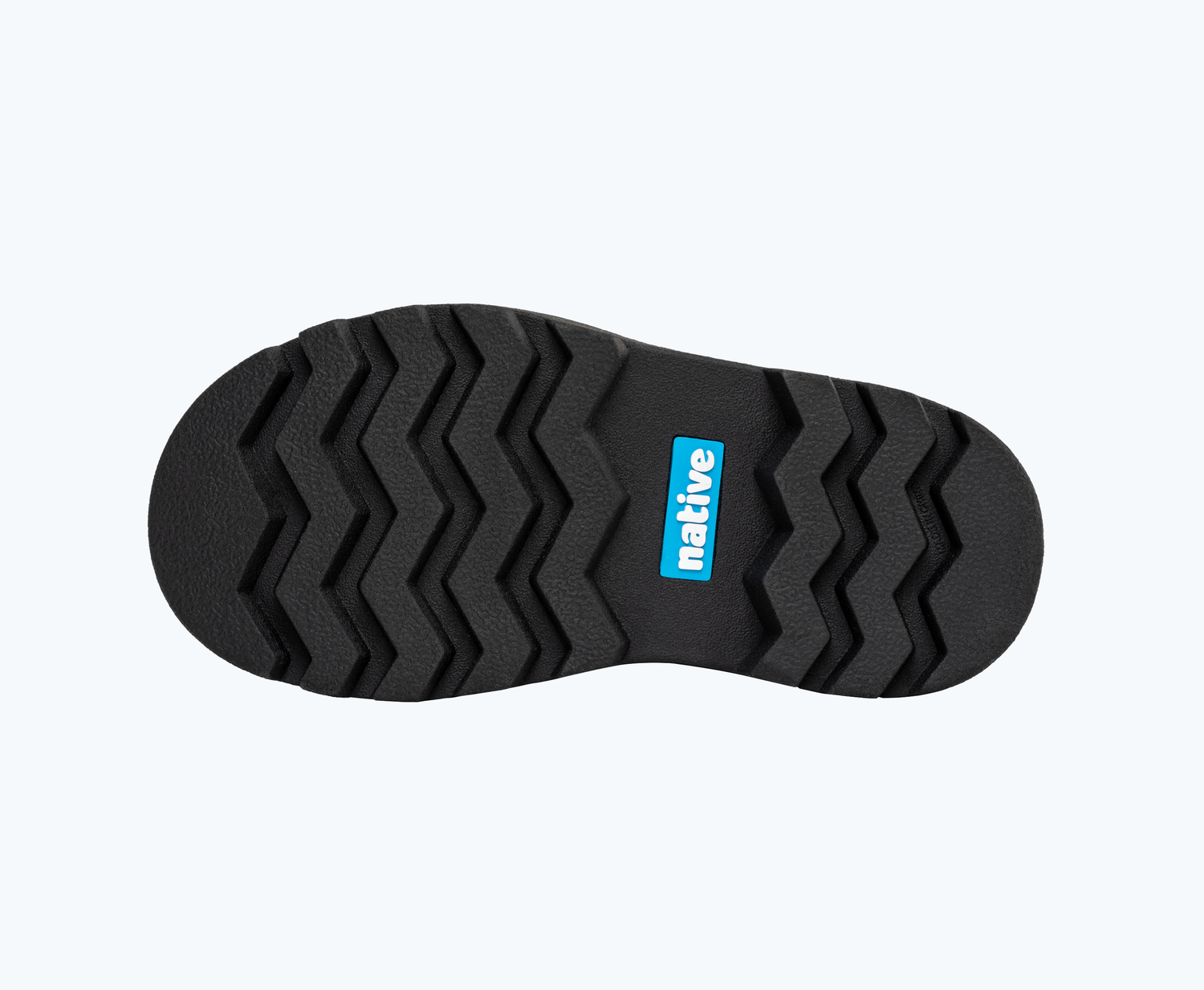Bottom view of a Native Shoes Kids Kensington Treklite Print Kids | Jiffy Black/ Jiffy Black/ Hollywood Warped Cheetah Footwear
