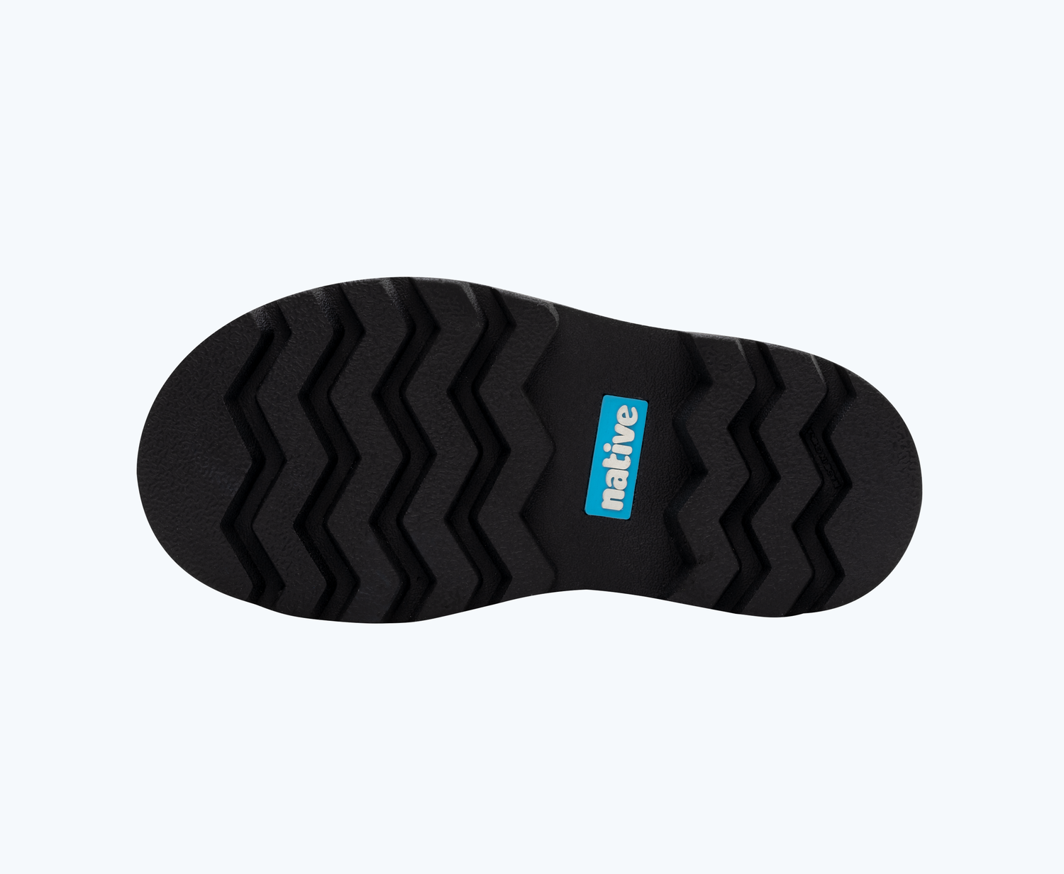 Bottom view of a Native Shoes Kids Kensington Treklite Glow Kids | Jiffy Black/ Jiffy Black/ Shell Lightning Xl Glow Footwear