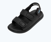 Angled view of a Native Shoes Kids Frankie Sugarlite Kids | Jiffy Black/ Jiffy Black Footwear