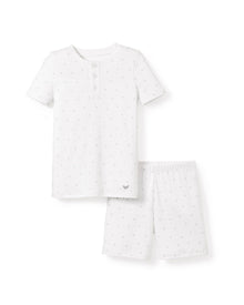 The Petite Plume Kids Pima Snug Fit Pajama Short Set in Grey Stars includes a short-sleeve top and elastic waistband shorts, crafted from soft Pima Cotton for ultimate comfort.