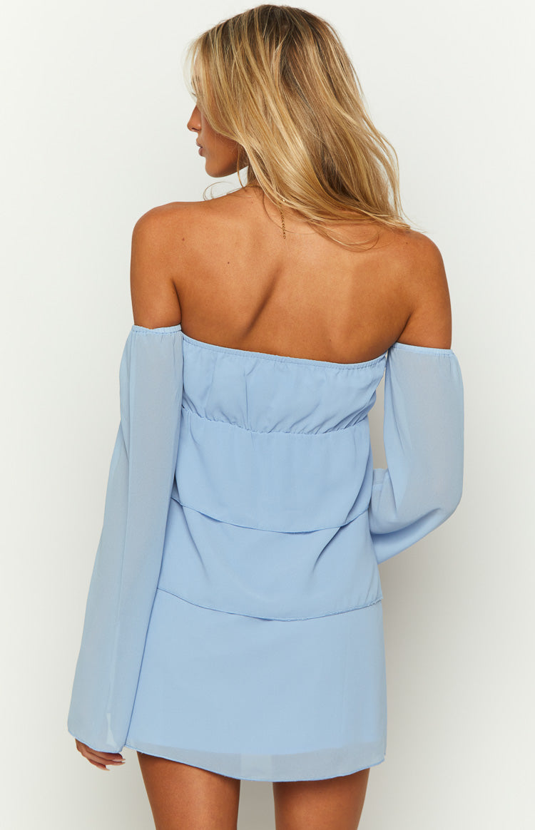 Rear view of a light blue off-shoulder mini dress with a ruched elasticated back bodice and tiered skirt