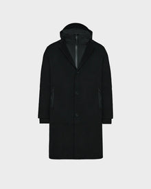 The Rudsak DRAL - 6124503 Black is a men’s wool jacket with a hood, featuring a versatile 2-in-1 design for comfort and warmth.