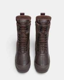 The REAGAN - 6224501 Espresso by Rudsak are dark brown high-top men’s winter boots with fur lining at the ankle and front laces, shown from above on a light background.