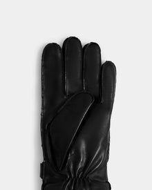 The Rudsak BORIS - M425001 Black men’s leather glove is displayed palm up against a light gray background, revealing four fingers and the thumb—an elegant, cold-weather essential.