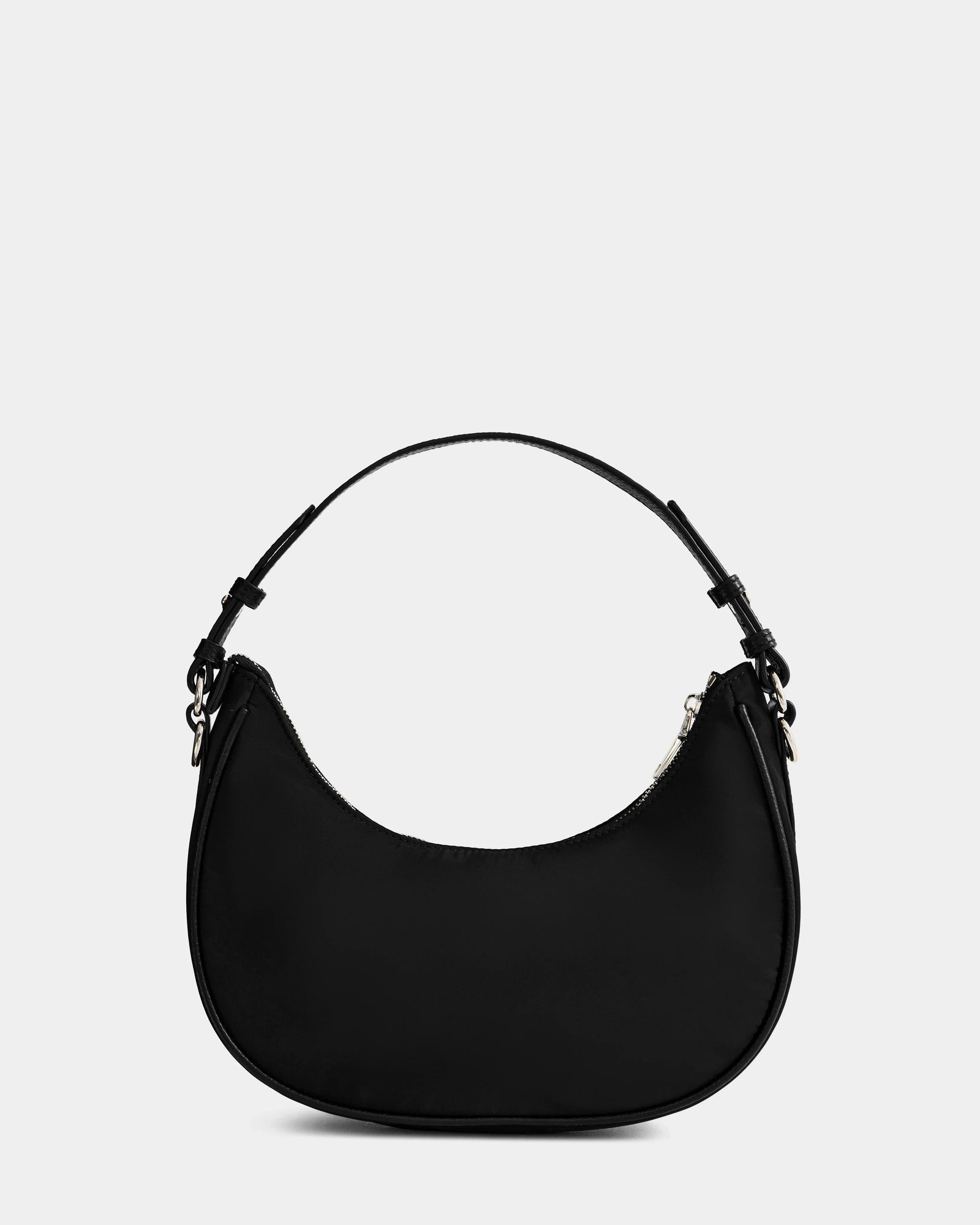 The Rudsak NIKKI - L325512 Black women's crescent hobo shoulder bag features a short strap and silver hardware, shown against a plain light gray background.