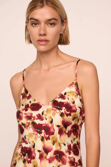 Model is wearing Inez Washable Silk Printed Slip in Botanical Flower Merlot