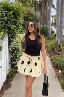 Beginning Boutique Henrietta Yellow Polka Dot Bubble Hem Mini Skirt yellow with black polka dots elasticated drawstring waist
