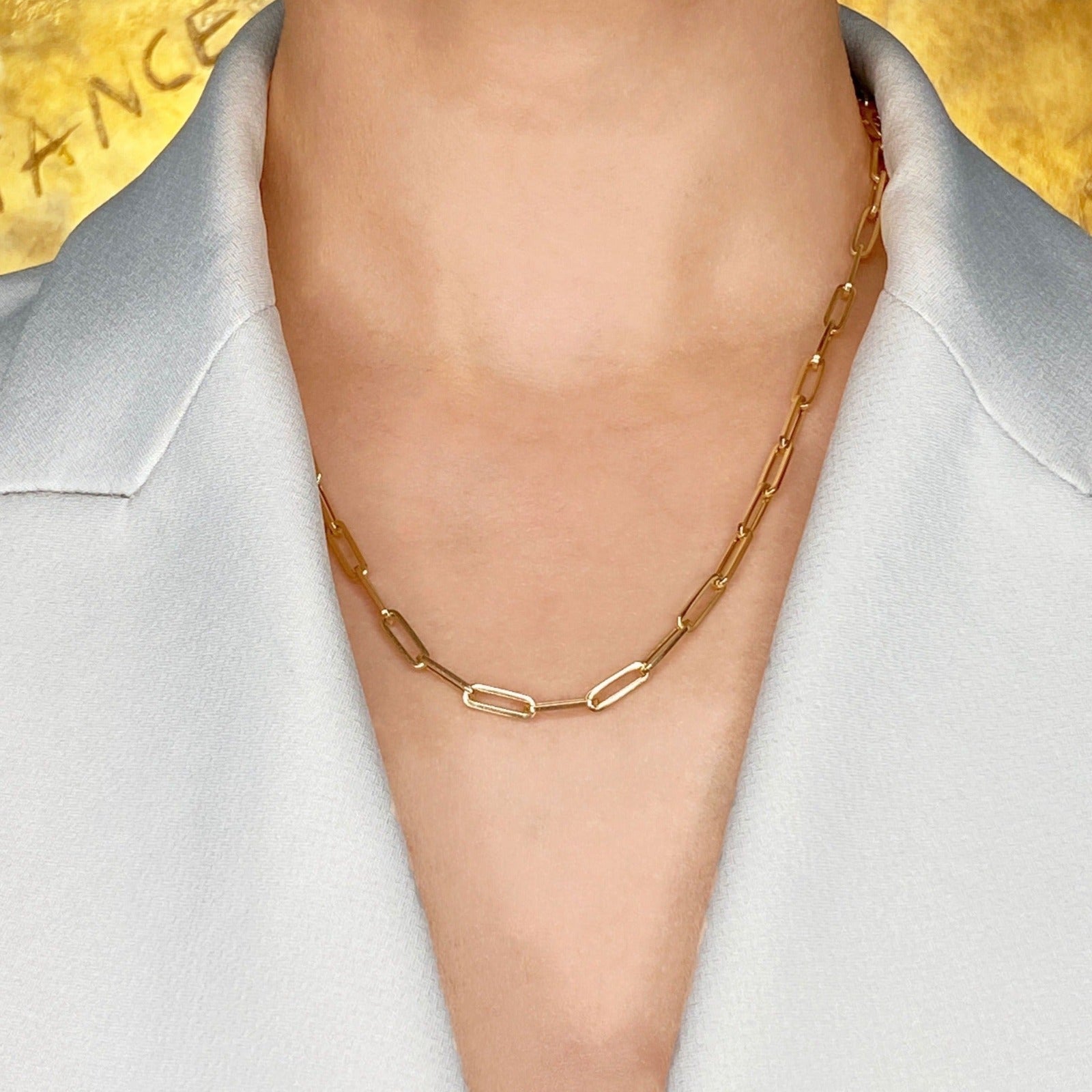 14k gold Chunky Paperclip Chain Necklace styled on a neck