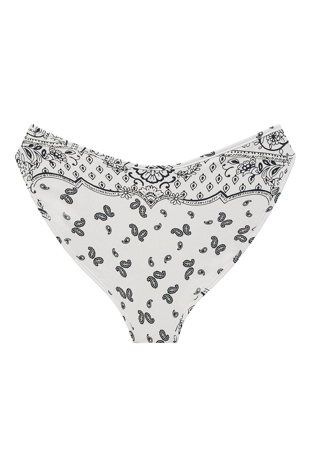 White bikini bottom with black bandana and paisley print pattern throughout and ruched waistband detail.
