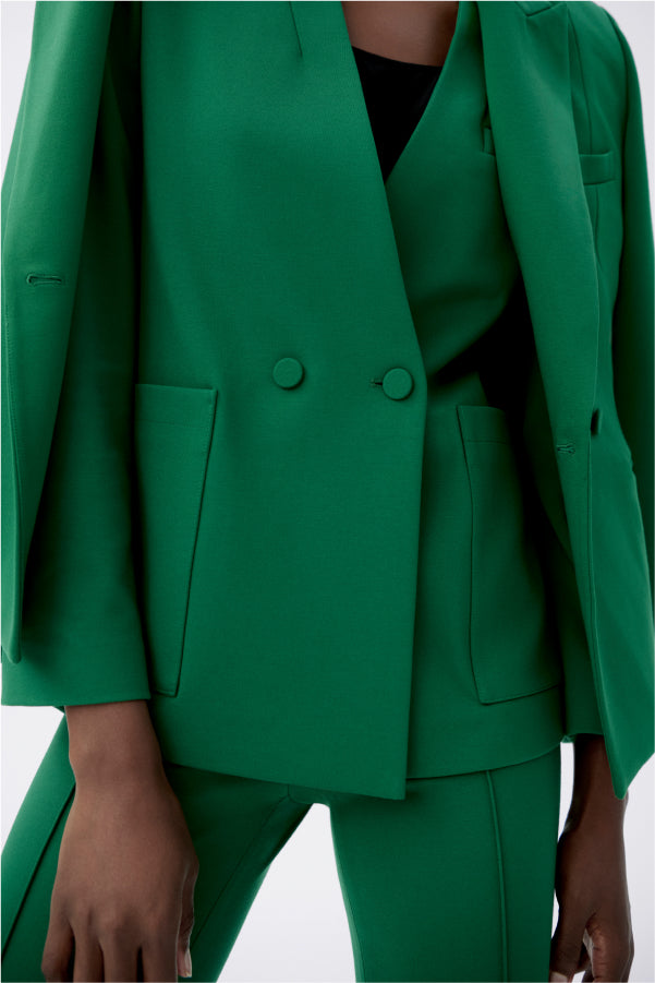 detail image of a woman wearing the janette jacket in shamrock | Exclude 