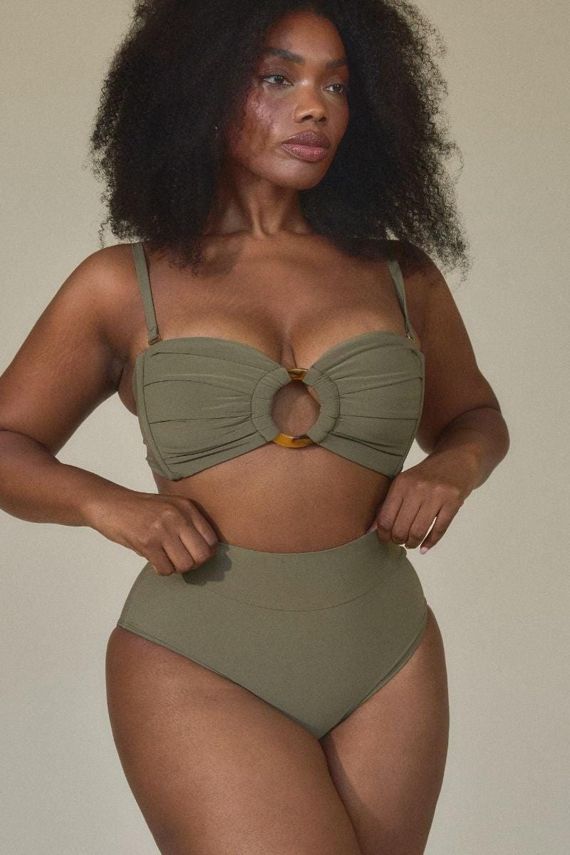 Khaki high-rise bikini bottom with ruched sides and wide waistband, shown on model.