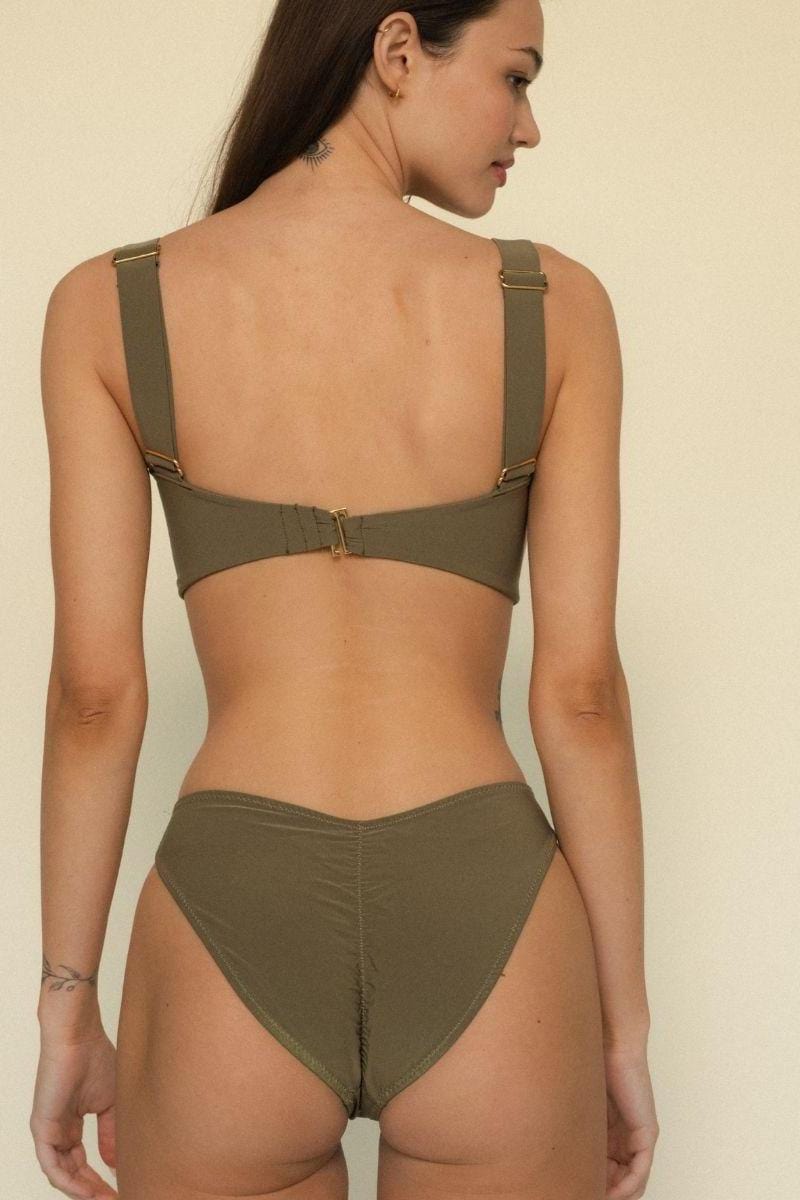 Khaki bikini bottom with zig-zag stitching and higher coverage waistband shown from back view.