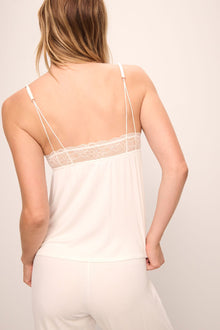 Model wears Mia TENCEL Modal Cami & Pant PJ Set in Ivory.