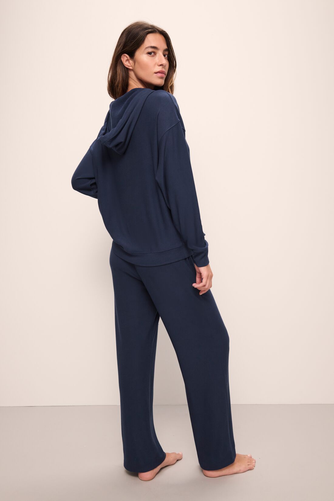 Model wears Softest Sweats Straight Leg Pant in Navy.