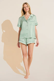 Model wears Inez Washable Silk Short PJ Set in Surf Spray/Agave.