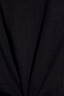 Model wears Organic Linen Knit Short in Black.