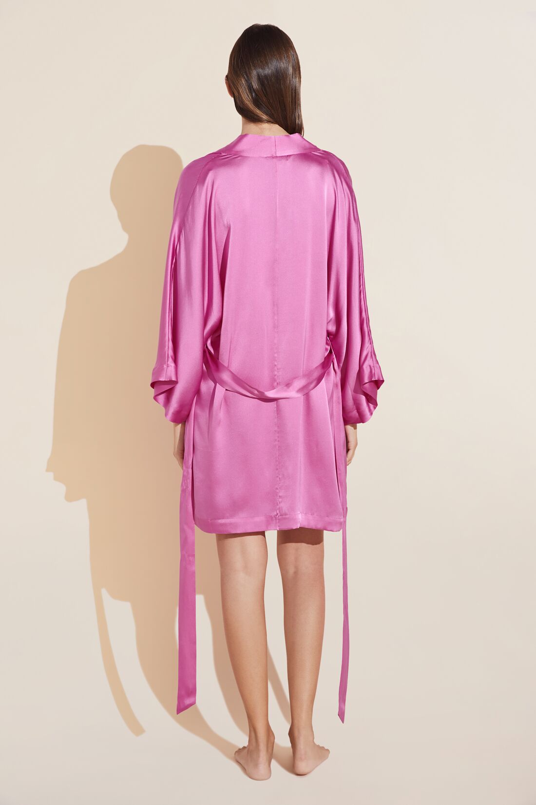 Model wears Inez Washable Silk Short Robe in Italian Rose.