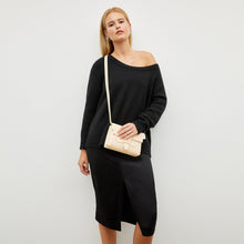 Image of a woman wearing the Penny Skirt in Black