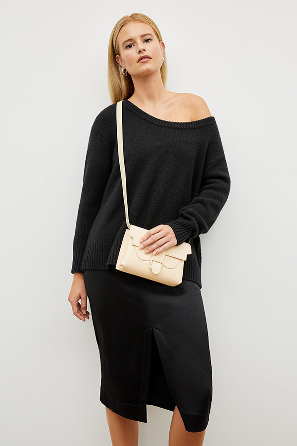 Image of a woman wearing the Penny Skirt in Black | Grid Hover | Exclude