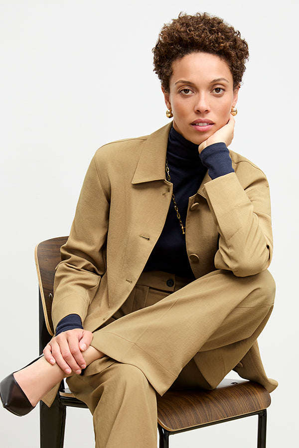 front image of a woman wearing the avelyn jacket in macaroon | Exclude