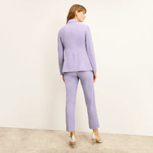 back image of a woman wearing the colby pants in light orchid