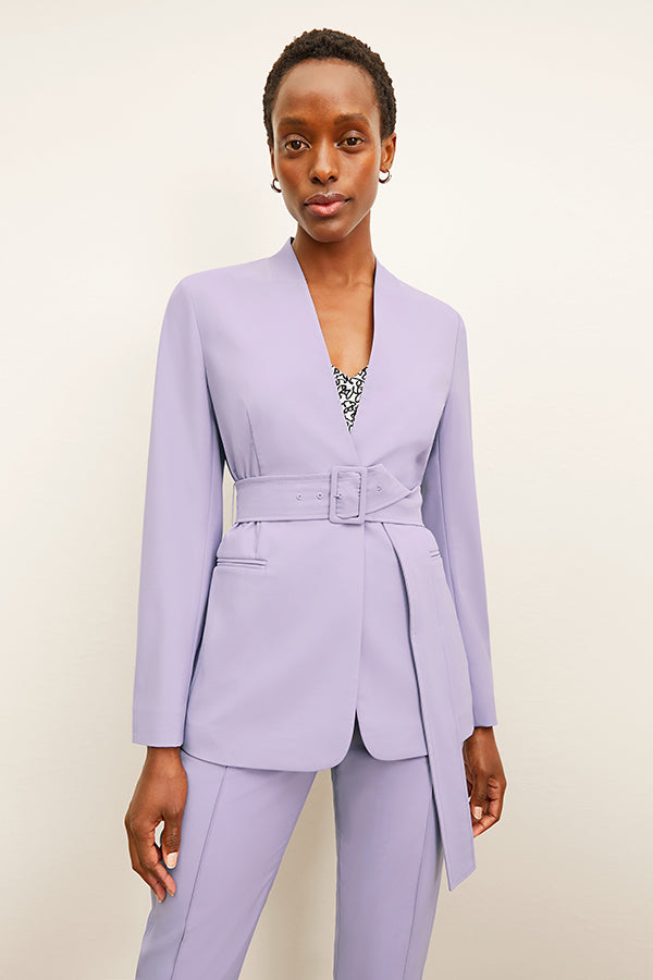 Front image of a woman wearing the Twidwell Blazer | Grid | Exclude