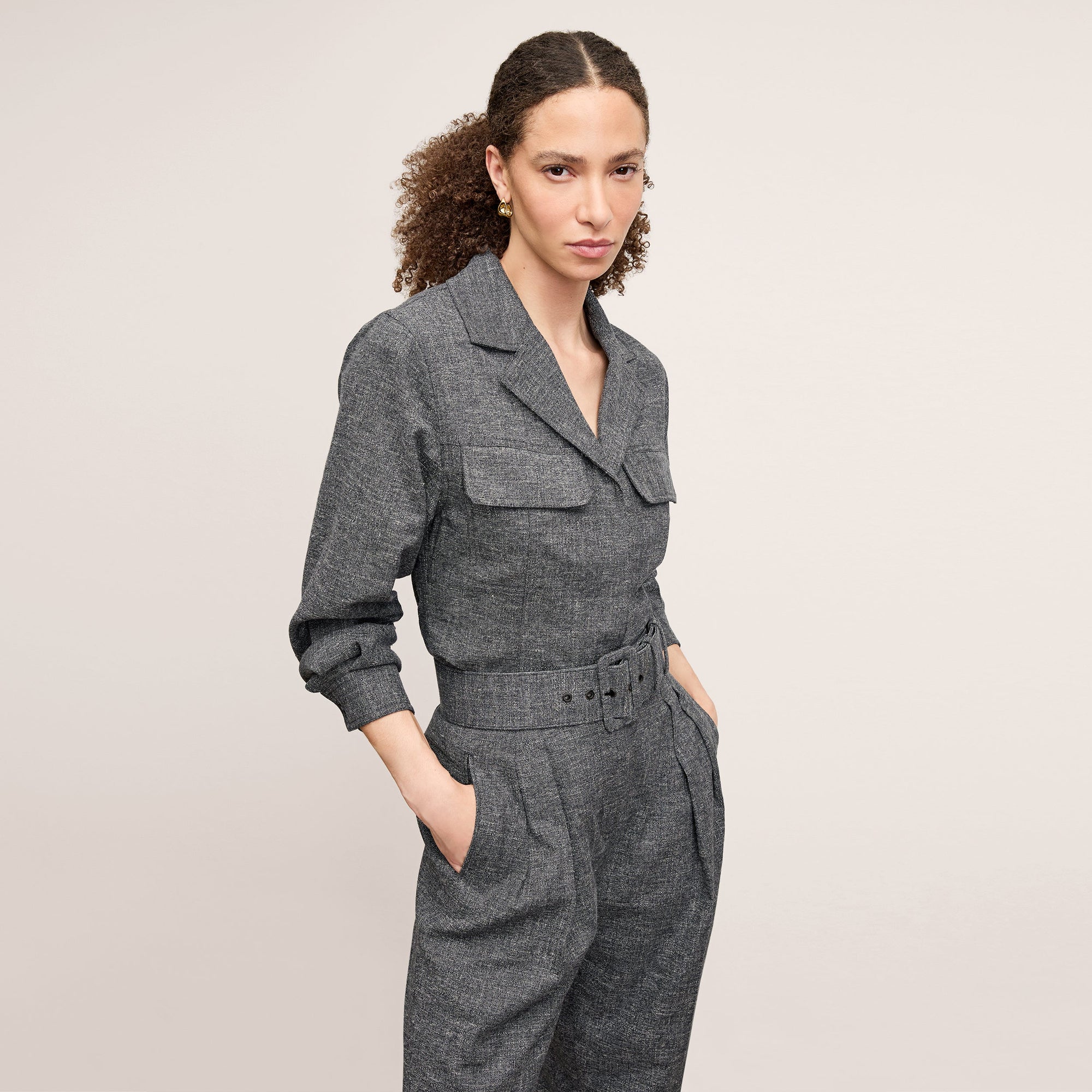 front image of a woman wearing the natalia jacket in black/white | Lead 