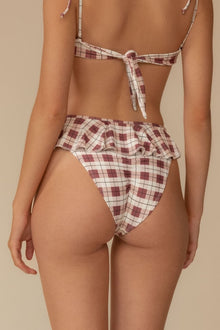 Maroon and cream plaid bikini bottom with ruffle detail at leg openings.