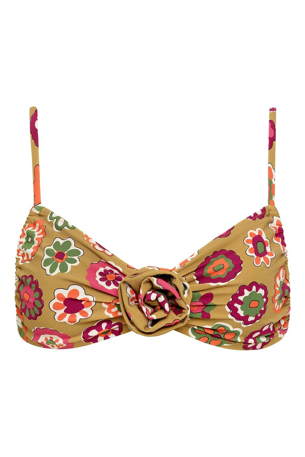 Tan bikini top with multicolored floral print featuring pink, red, orange, and green flowers with a center ring detail and ad