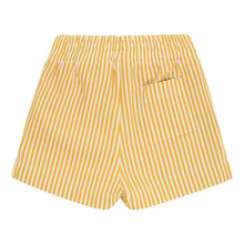 Yellow and white vertical striped mini swim trunk with front pocket detail.
