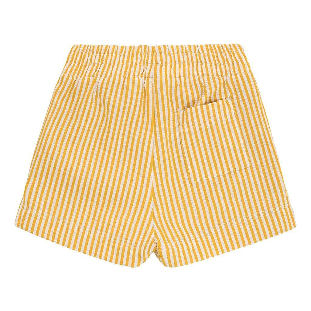 Yellow and white vertical striped mini swim trunk with front pocket detail.