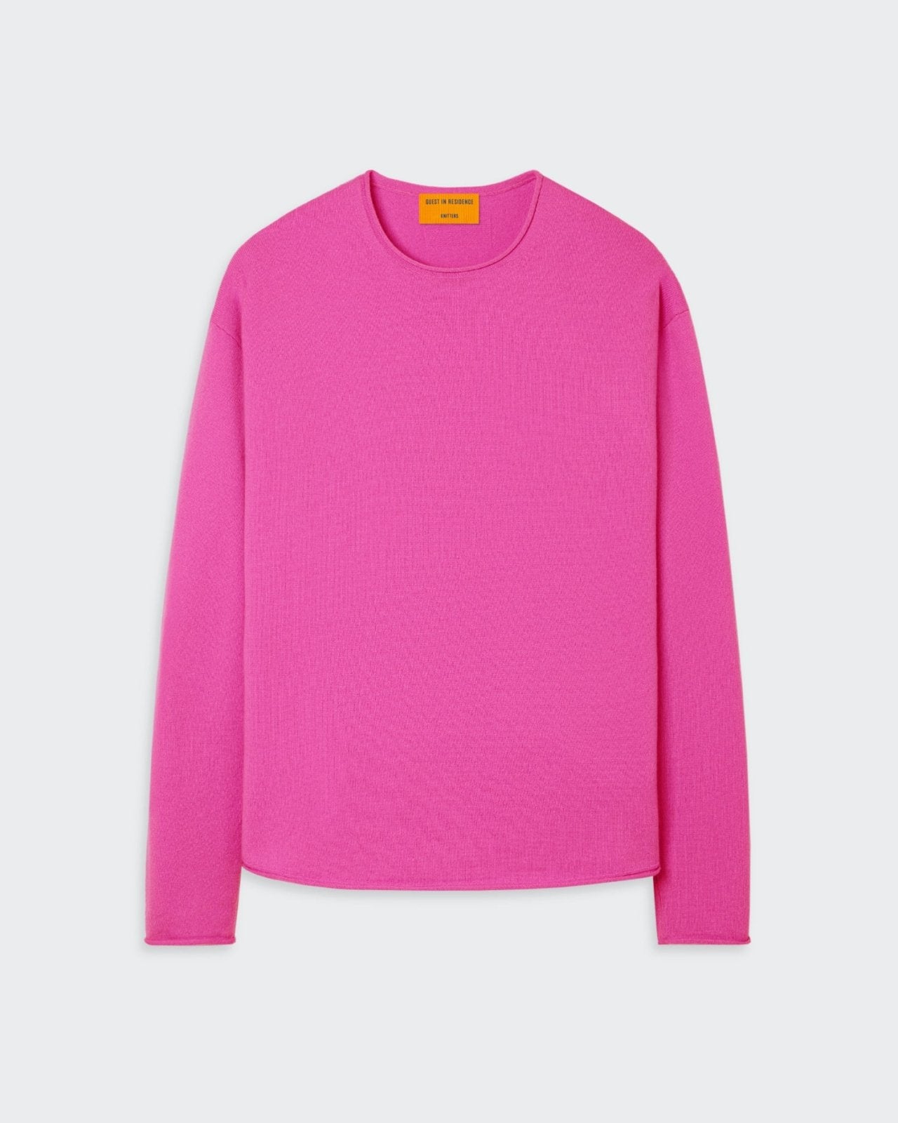 Oversized crew neck sweater in fuchsia pink color.