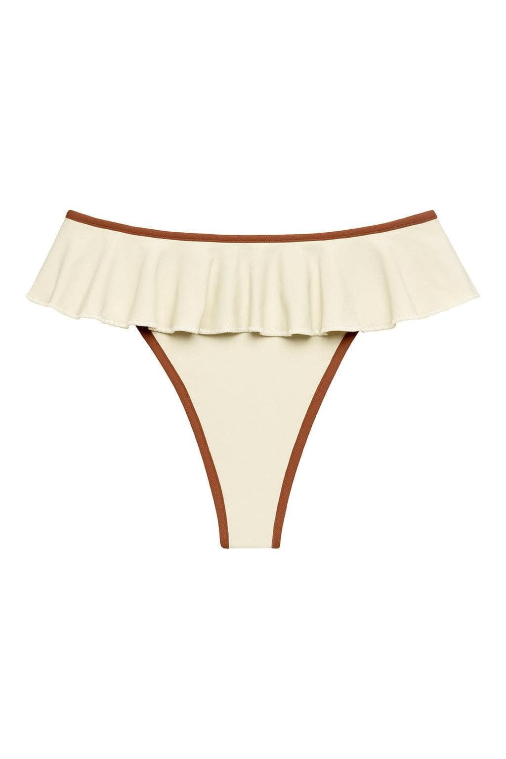 Cream bikini bottom with terracotta binding and pleated ruffle across the front waistband.
