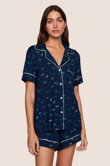 Model is wearing Gisele Printed TENCEL Modal Relaxed Short PJ Set  in Forest Pine Navy/Ivory