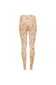 Palmas Wide Band Legging with yellow curved stripes and red dots on beige fabric.