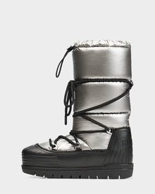 The Rudsak TISH - L223508 Pewter is a womens winter boot in metallic silver and black, featuring thick padding, black front crisscross laces, a chunky platform sole, and RUB embossed on the heel.
