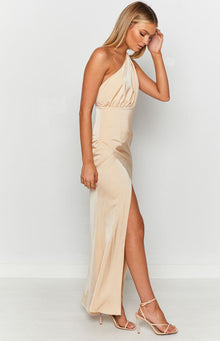 Gold one-shoulder formal dress with ruched bodice, fitted waist, draped midi skirt, high split, and criss-cross back