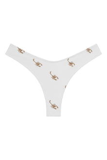 White bikini bottom with repeating brown scorpion embroidery and zig-zag stitch detailing.