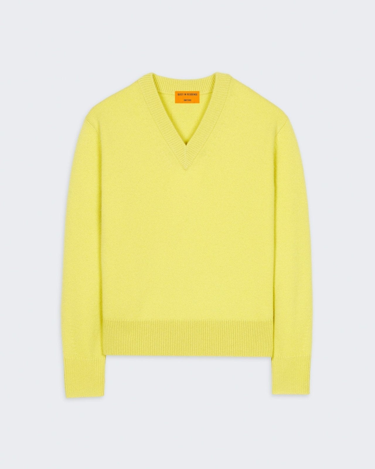 The V - Lemon women's lightweight 100% cashmere V-neck sweater with ribbed cuffs and hem.