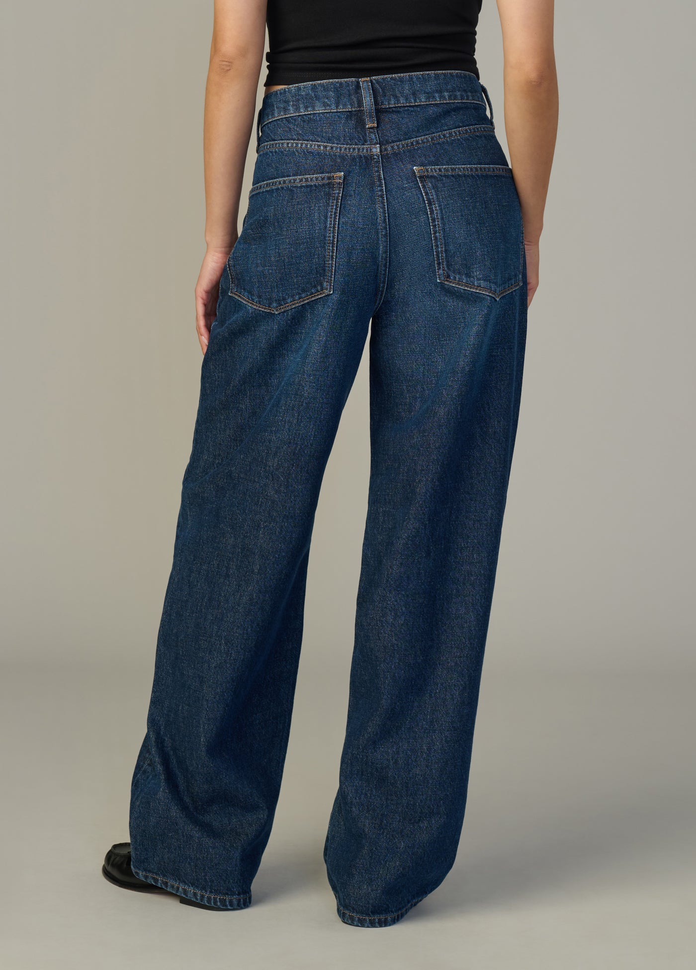 Rear pocket stitching close-up on Ryan Petite jeans
