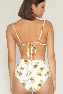White high-rise bikini bottom with gold filigree floral print and gold metallic trim details.