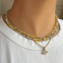 Opal necklaces layered over Molten Diamond Solitaire Charm with Marquise Diamond on a Bead Chain.