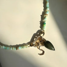 Peruvian faceted opal necklace with pavé face charm lock dropping an 